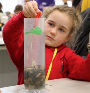 A young visitor tries to figure it out...