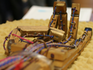 A close-up of the wooden hand model
